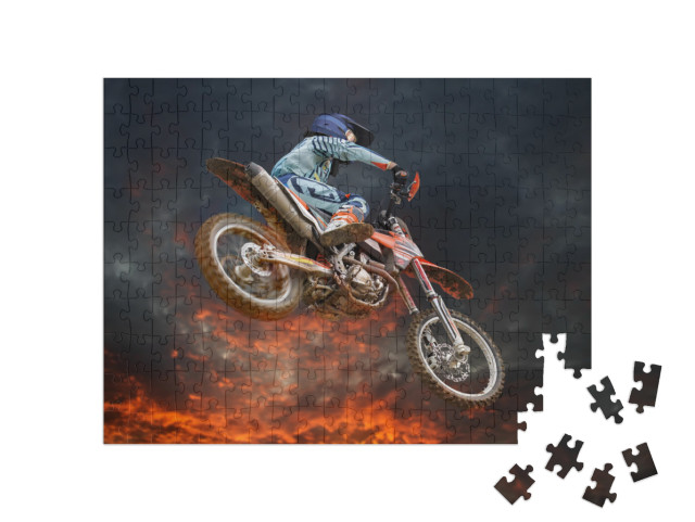 Jumping Motocross Rider with Firestorm in the Background... Jigsaw Puzzle with 200 pieces