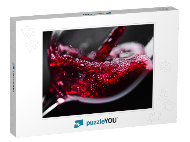 Red Wine in Wineglass on Black Background... Jigsaw Puzzle