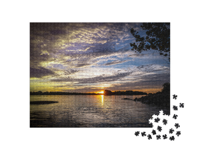 A Beautiful View of the Sun on the Horizon Next to the Mi... Jigsaw Puzzle with 1000 pieces