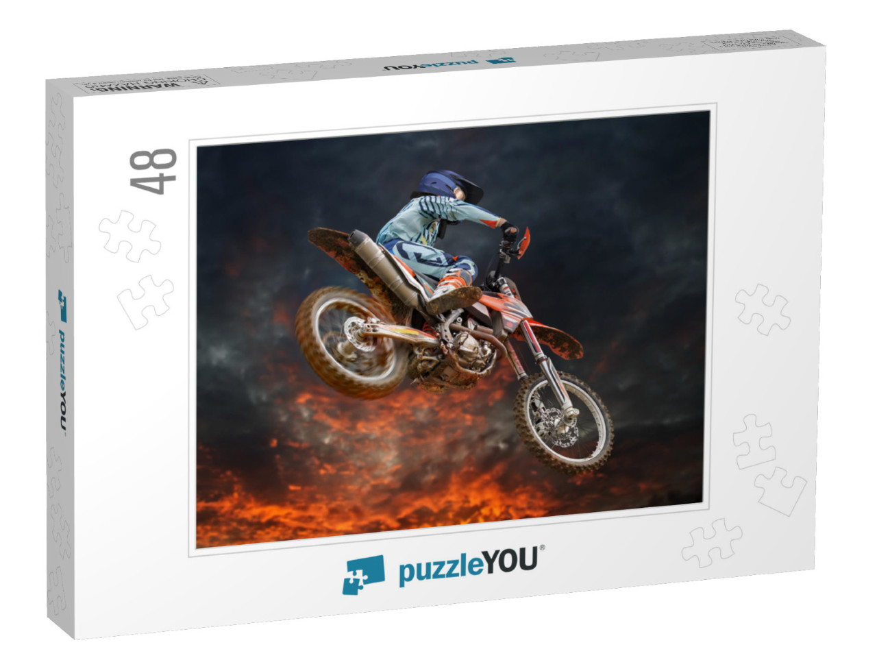 Jumping Motocross Rider with Firestorm in the Background... Jigsaw Puzzle with 48 pieces