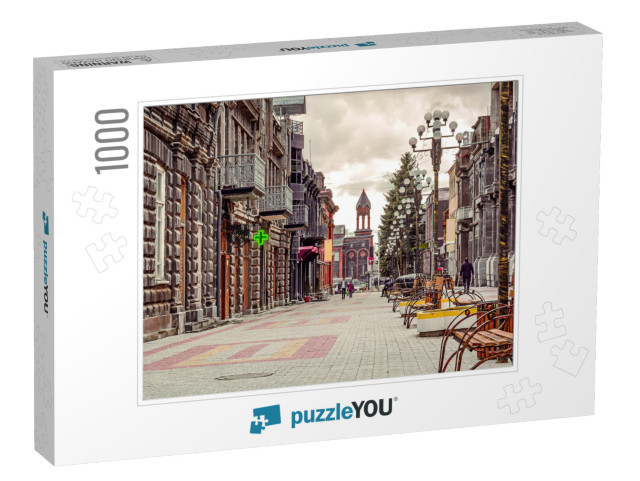 Scenic Old Paving Street with Church on the Background in... Jigsaw Puzzle with 1000 pieces