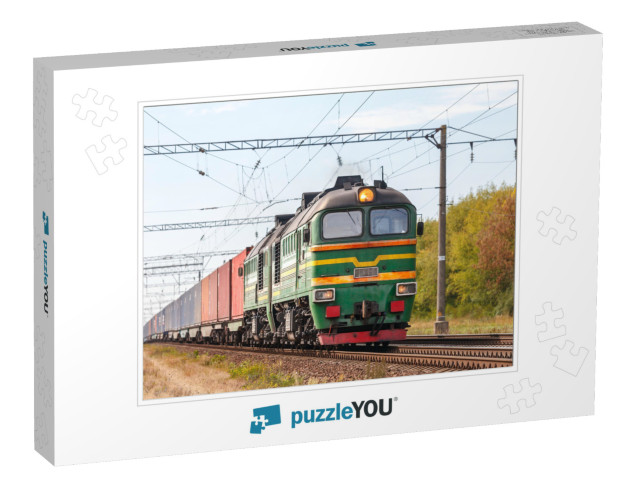 A Powerful Green Diesel Locomotive 2m62 Pulls a Freight T... Jigsaw Puzzle