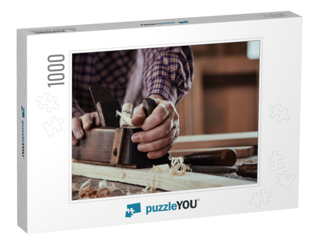 Carpenter or Joiner Planing a Plank of Wood Smoothing the... Jigsaw Puzzle with 1000 pieces