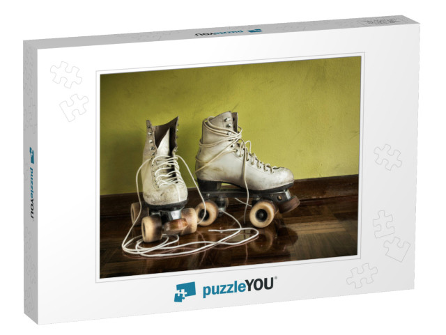 Old Worn Roller Skates with Big Shoe-Laces on a Yellow Wa... Jigsaw Puzzle