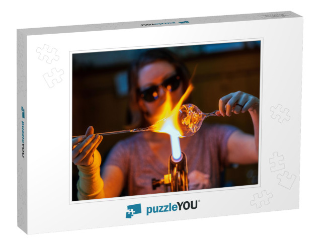 A glass blower melting glass Jigsaw Puzzle