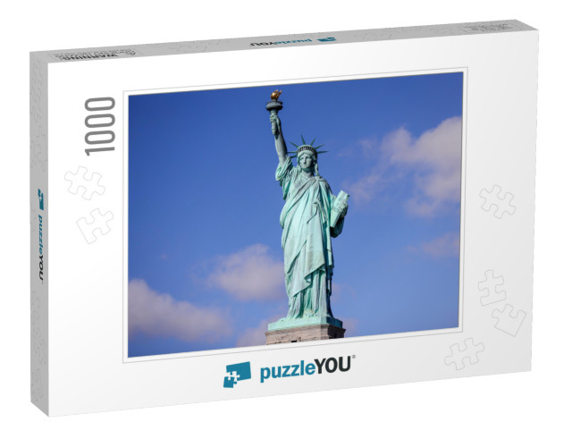 The Statue of Liberty in New York Against a Blue Sky... Jigsaw Puzzle with 1000 pieces