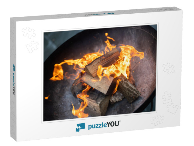 Outdoor Log Burning Fire in Black Metal Fire Pit. Chopped... Jigsaw Puzzle