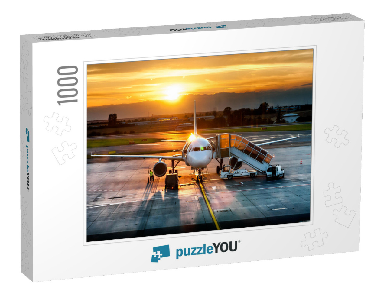 Passenger Airplane on Runway Near the Terminal in an Airp... Jigsaw Puzzle with 1000 pieces