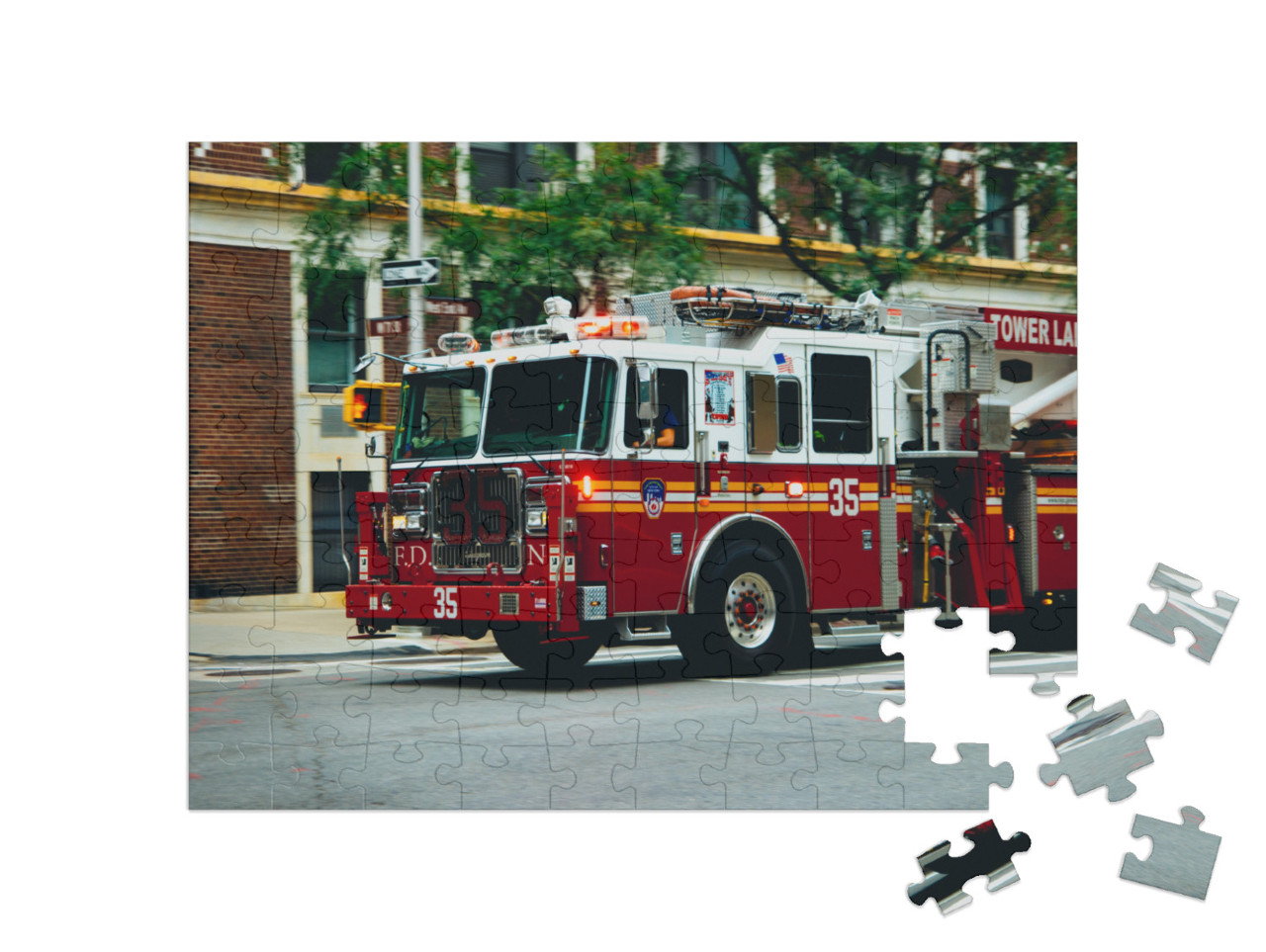 Nyc Firetruck Driving on a Road... Jigsaw Puzzle with 100 pieces