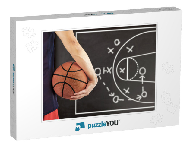 Cropped Image of a Young Man Holding a Basketball Ball wi... Jigsaw Puzzle