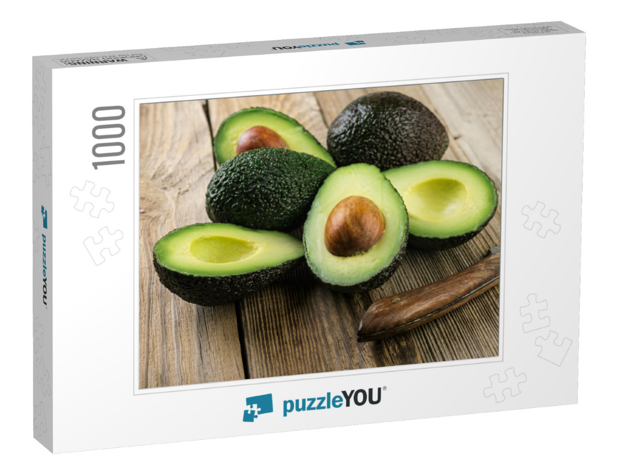 Fresh Sliced Avocado on Wooden Table. Vegetarian Food Con... Jigsaw Puzzle with 1000 pieces