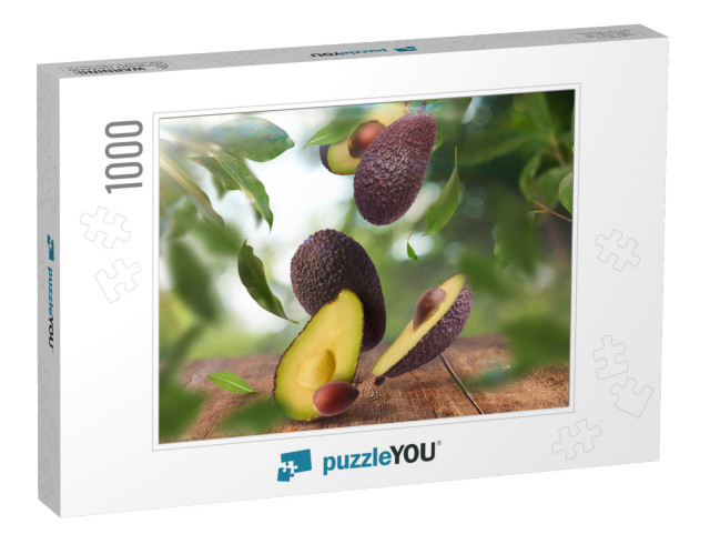 Fresh Raw Avocados Falling in the Air on Wooden Table Ove... Jigsaw Puzzle with 1000 pieces