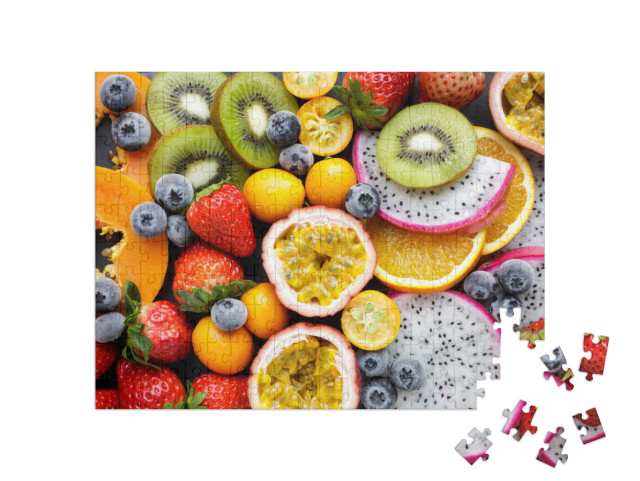 Fresh Fruits on a Black Background. Exotic Fresh Fruits o... Jigsaw Puzzle with 200 pieces