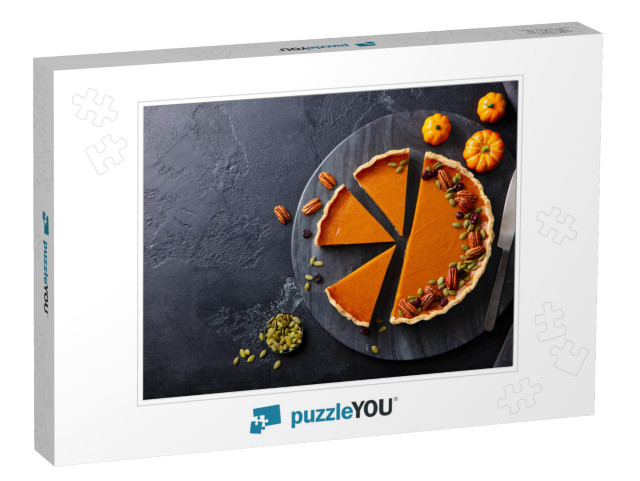 Pumpkin Pie on Marble Cutting Board. Dark Background. Cop... Jigsaw Puzzle