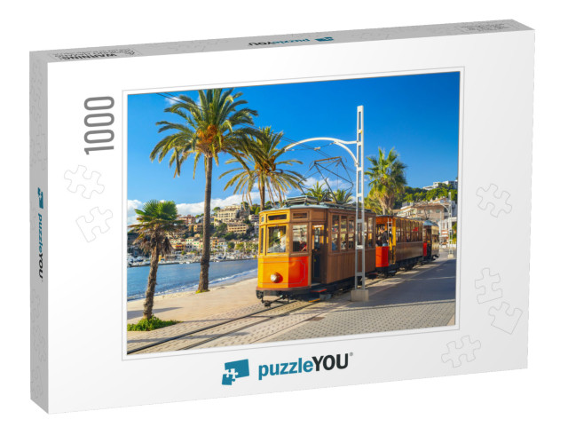 The Famous Orange Tram Runs from Soller to Port De Soller... Jigsaw Puzzle with 1000 pieces